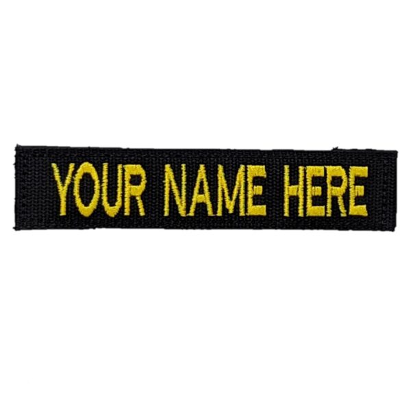 TactiTether custom name patch with "YOUR NAME HERE" in yellow text on a black background